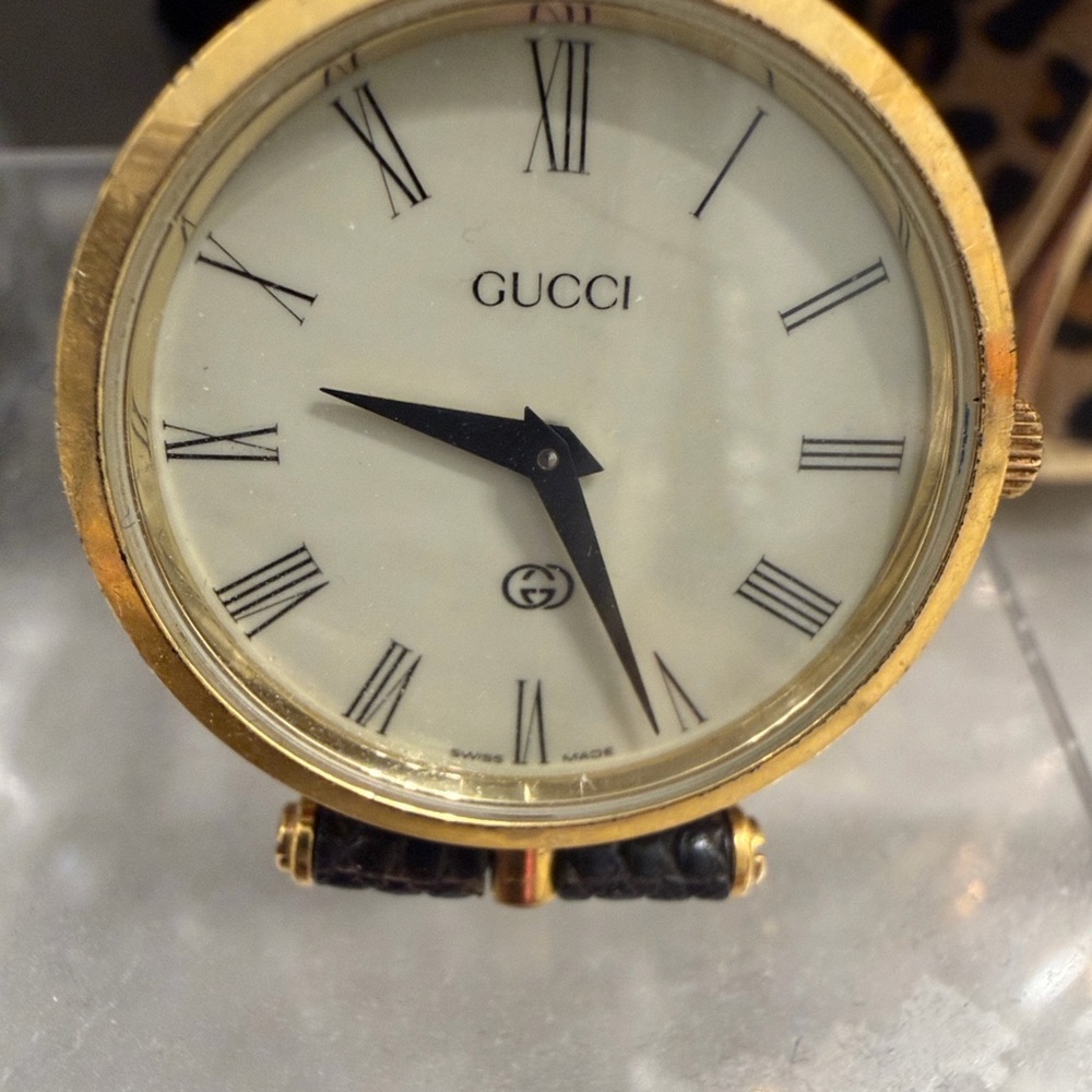 Gucci Gold and Black Roman Numeral Clock
